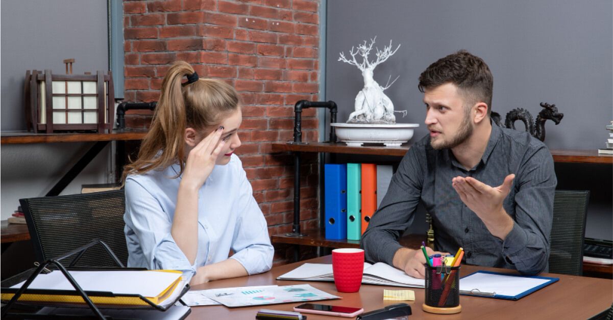 Employer and employee having a conversation