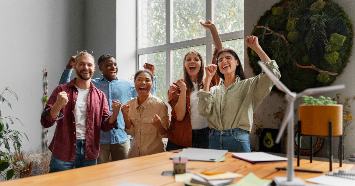 A team of people cheering